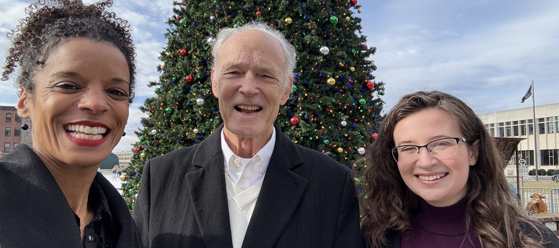 Family in front of new house